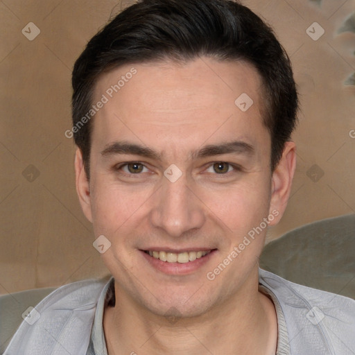 Joyful white young-adult male with short  brown hair and brown eyes