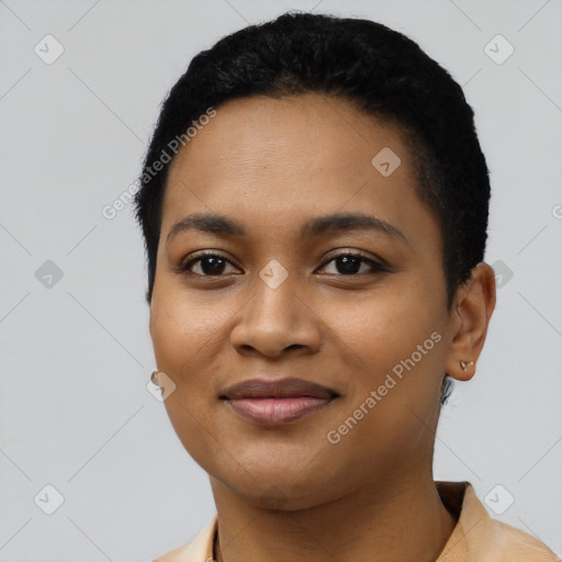 Joyful latino young-adult female with short  black hair and brown eyes