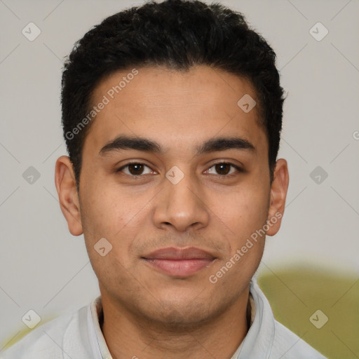 Joyful latino young-adult male with short  brown hair and brown eyes