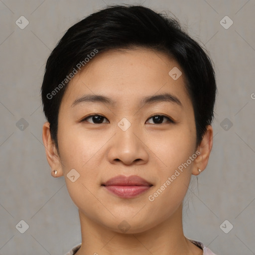 Joyful asian young-adult female with short  black hair and brown eyes