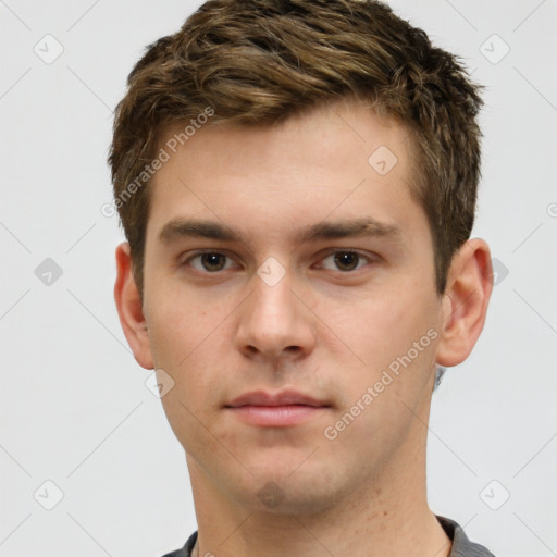 Neutral white young-adult male with short  brown hair and grey eyes