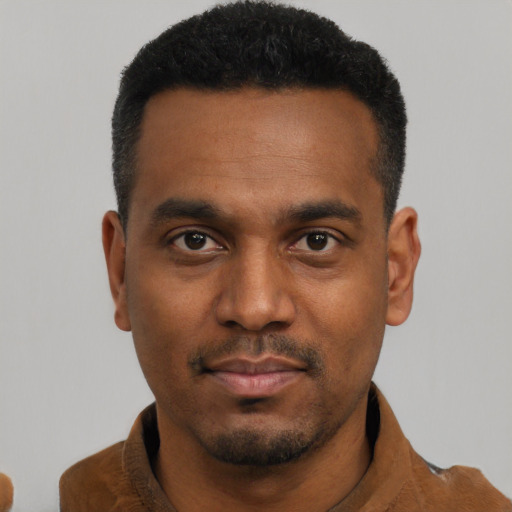 Neutral black young-adult male with short  black hair and brown eyes