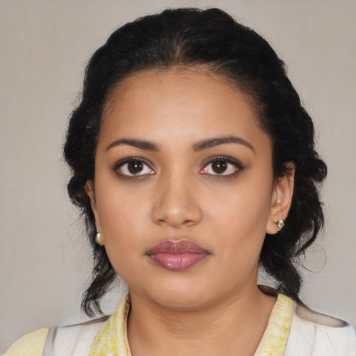 Neutral latino young-adult female with medium  black hair and brown eyes