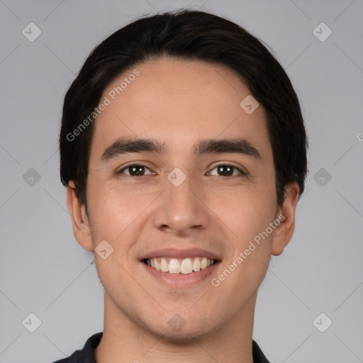 Joyful white young-adult male with short  black hair and brown eyes