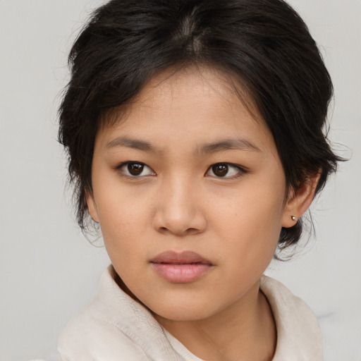 Neutral white young-adult female with medium  brown hair and brown eyes