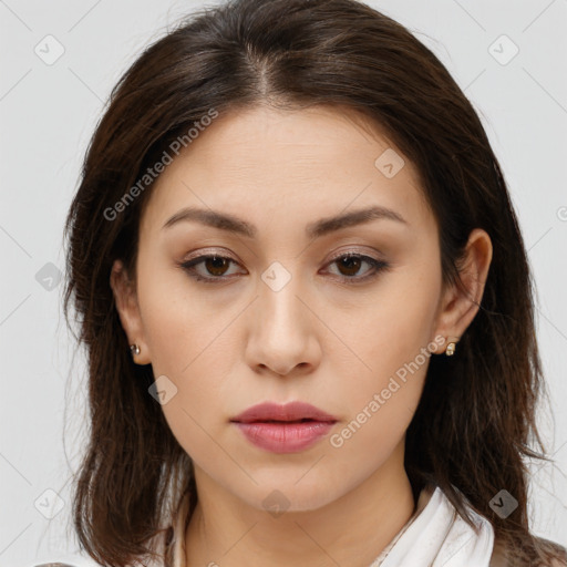 Neutral white young-adult female with long  brown hair and brown eyes