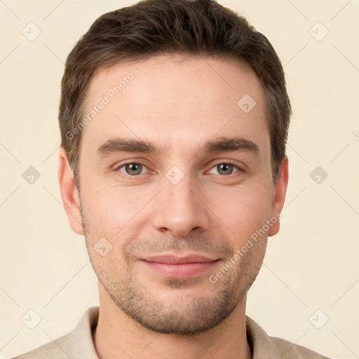 Joyful white young-adult male with short  brown hair and brown eyes