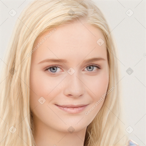 Joyful white young-adult female with long  brown hair and blue eyes