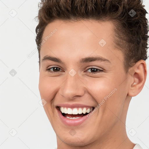 Joyful white young-adult female with short  brown hair and brown eyes