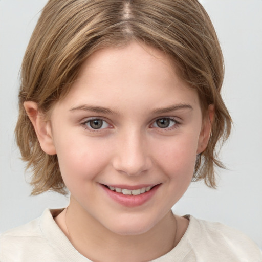 Joyful white child female with medium  brown hair and brown eyes