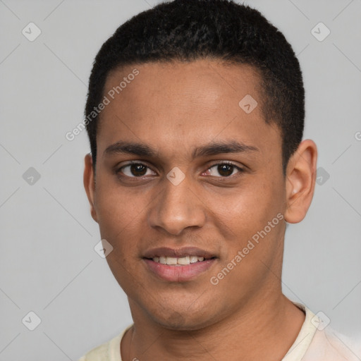 Joyful black young-adult male with short  brown hair and brown eyes