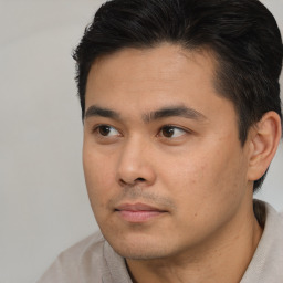 Neutral asian young-adult male with short  brown hair and brown eyes