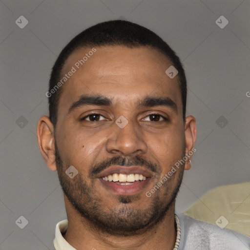 Joyful black young-adult male with short  black hair and brown eyes