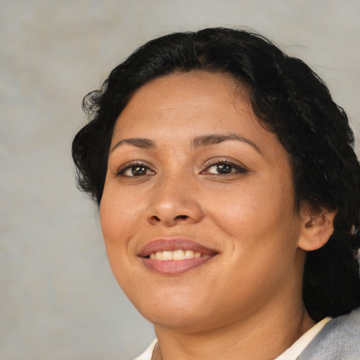 Joyful asian young-adult female with medium  black hair and brown eyes