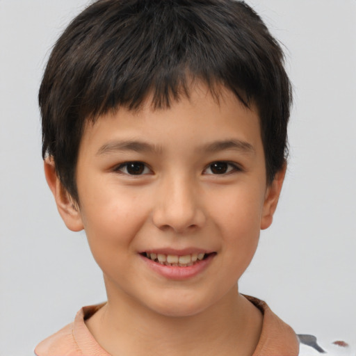 Joyful asian child female with short  brown hair and brown eyes