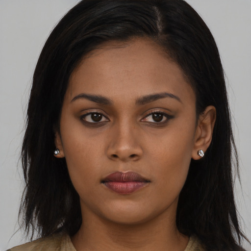 Neutral asian young-adult female with long  brown hair and brown eyes