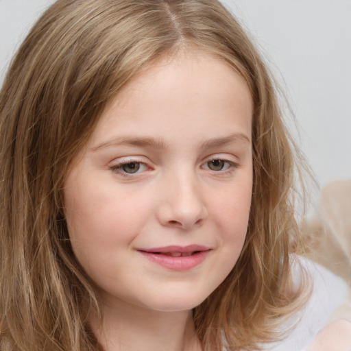 Joyful white child female with long  brown hair and grey eyes