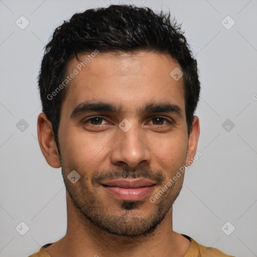 Joyful latino young-adult male with short  black hair and brown eyes