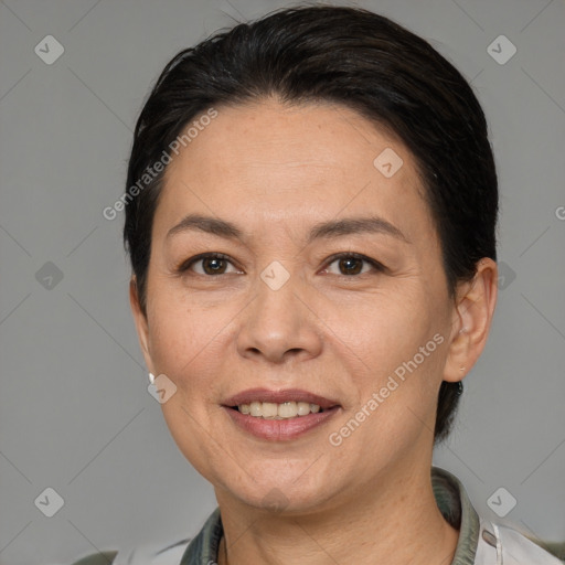 Joyful white adult female with short  brown hair and brown eyes