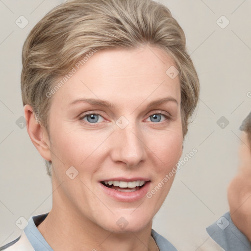 Joyful white young-adult female with short  brown hair and grey eyes