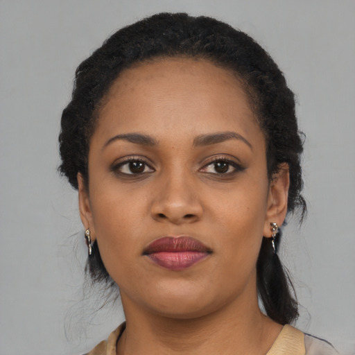 Neutral black young-adult female with long  black hair and brown eyes
