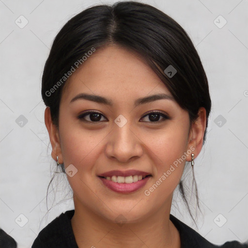 Joyful asian young-adult female with long  brown hair and brown eyes