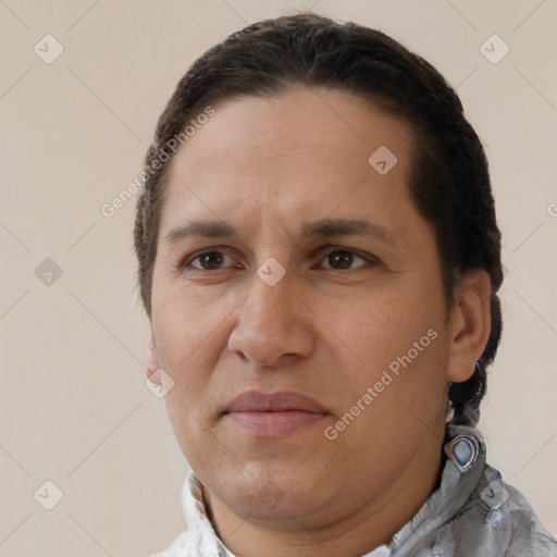 Joyful white adult male with short  brown hair and brown eyes