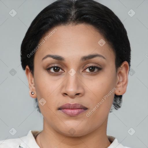 Joyful latino young-adult female with short  brown hair and brown eyes