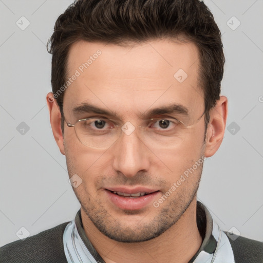 Joyful white adult male with short  brown hair and brown eyes