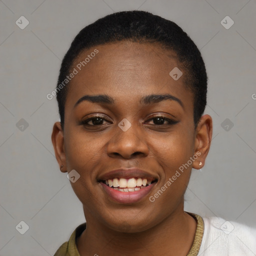 Joyful black young-adult female with short  black hair and brown eyes