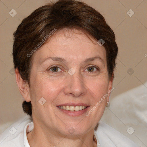 Joyful white adult female with short  brown hair and brown eyes