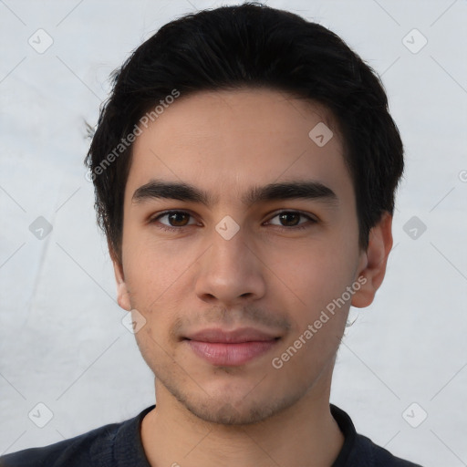 Joyful white young-adult male with short  black hair and brown eyes