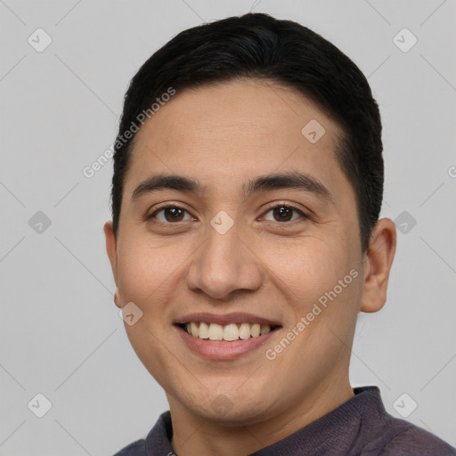 Joyful asian young-adult male with short  brown hair and brown eyes