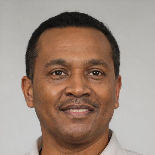 Neutral latino adult male with short  black hair and brown eyes
