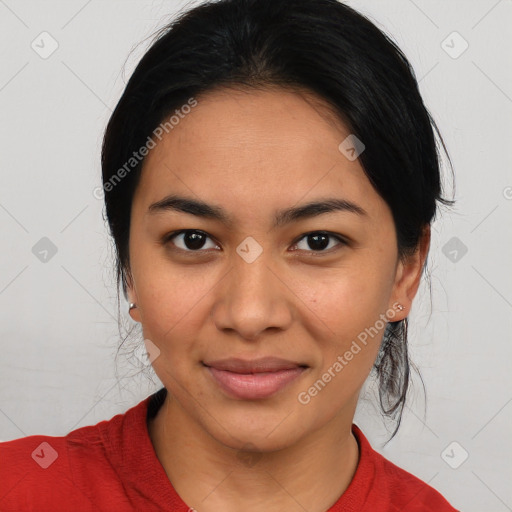 Joyful latino young-adult female with medium  black hair and brown eyes