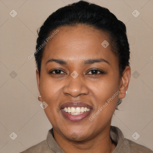 Joyful black young-adult female with short  black hair and brown eyes