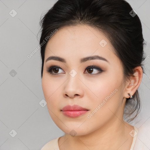 Neutral asian young-adult female with medium  brown hair and brown eyes