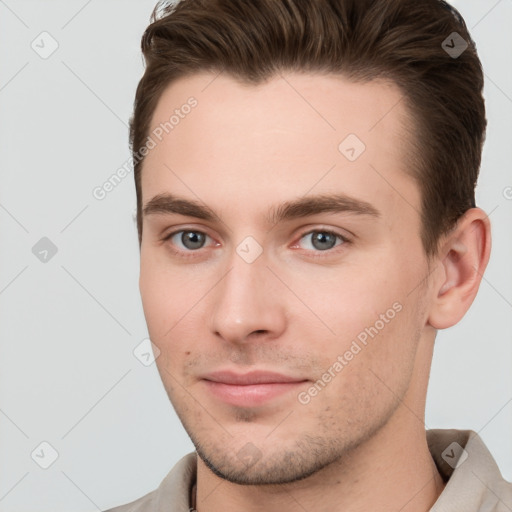 Neutral white young-adult male with short  brown hair and brown eyes