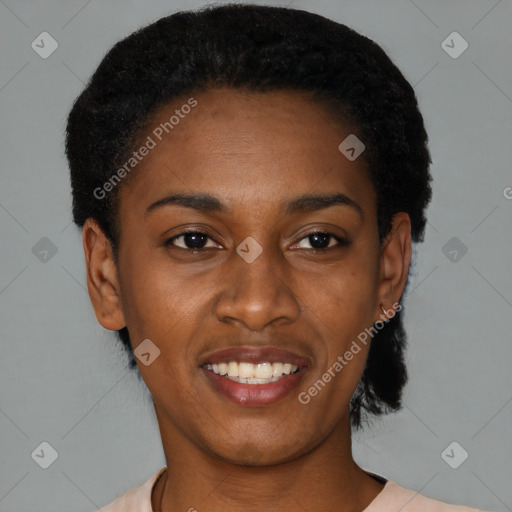 Joyful black young-adult female with short  black hair and brown eyes