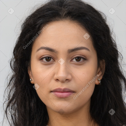 Joyful latino young-adult female with long  brown hair and brown eyes