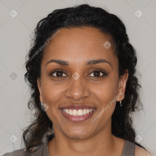 Joyful black young-adult female with medium  black hair and brown eyes