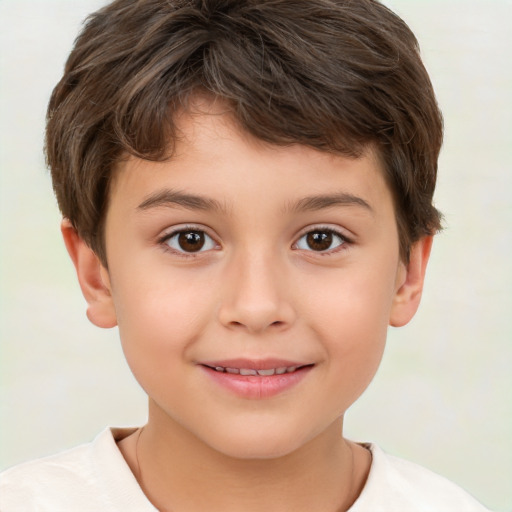 Joyful white child male with short  brown hair and brown eyes