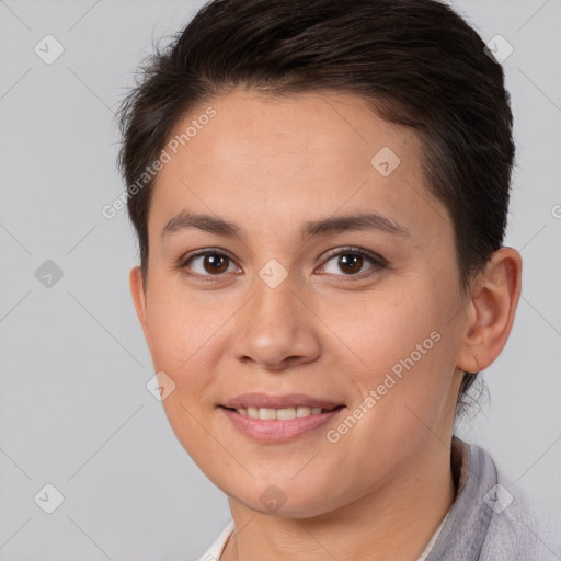 Joyful white young-adult female with short  brown hair and brown eyes