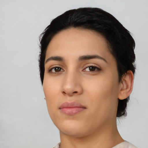 Neutral latino young-adult female with medium  black hair and brown eyes