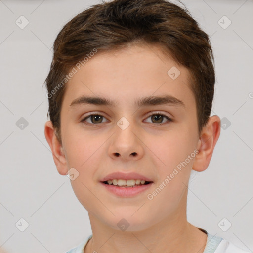 Joyful white child male with short  brown hair and brown eyes