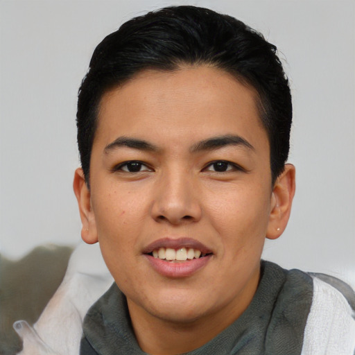 Joyful asian young-adult female with short  brown hair and brown eyes