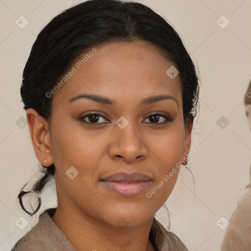 Joyful black young-adult female with medium  brown hair and brown eyes