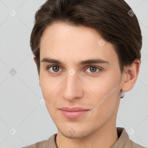 Neutral white young-adult male with short  brown hair and brown eyes