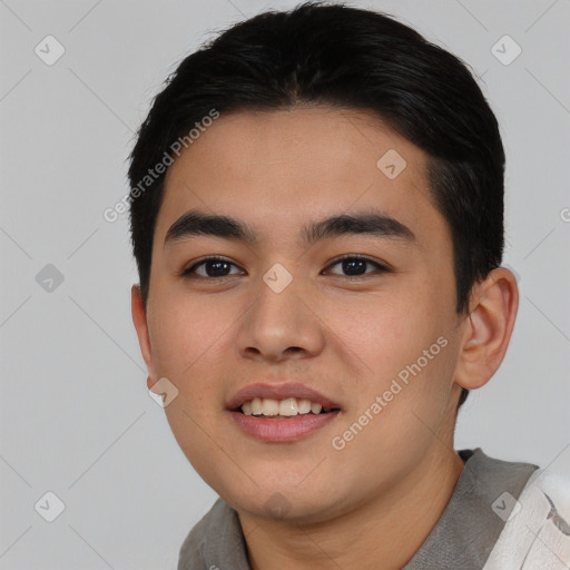 Joyful asian young-adult male with short  black hair and brown eyes