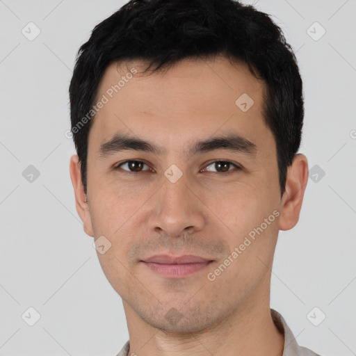 Joyful asian young-adult male with short  brown hair and brown eyes